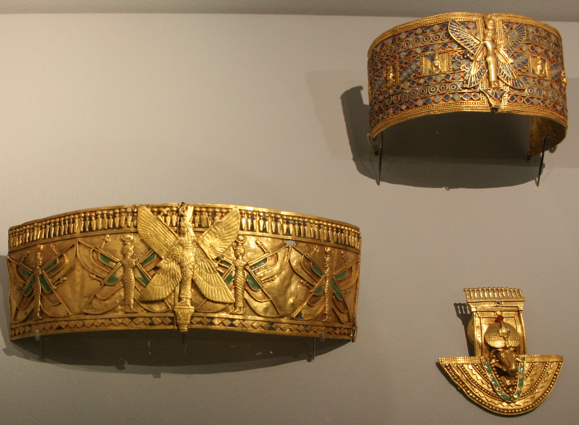 Gold jewelry from the treasure of Kushite queen Amanishakheto, including rings and bracelets, displayed at a museum